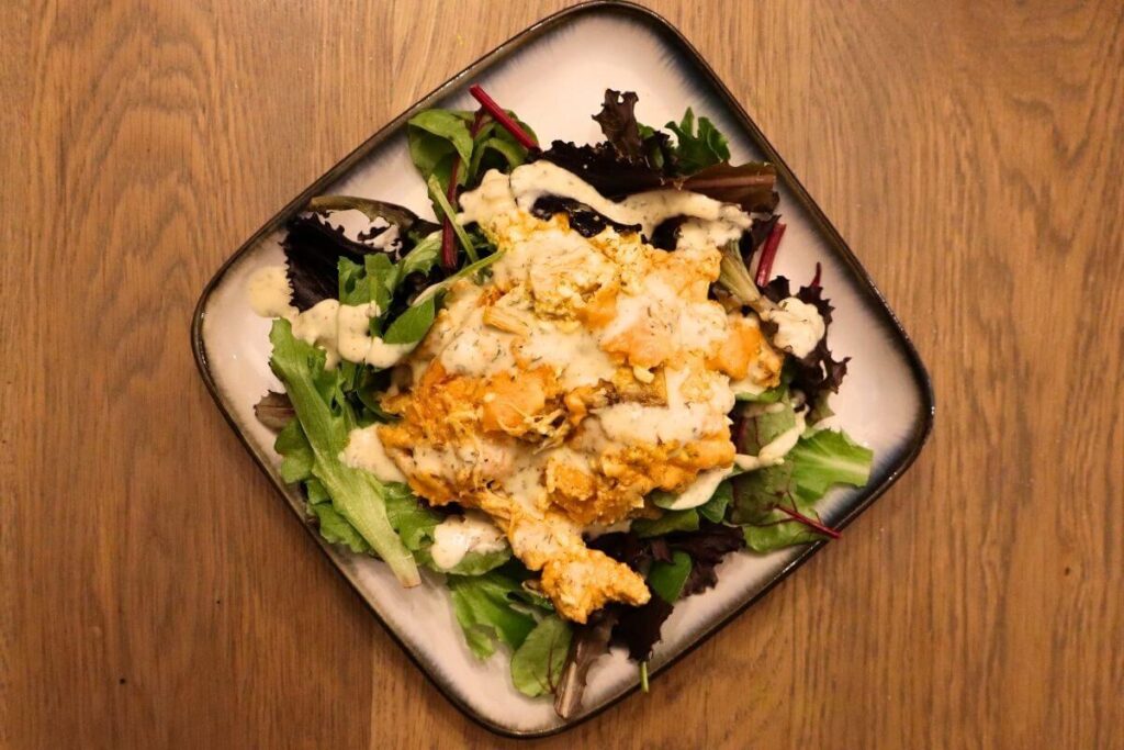 buffalo chicken dip on top of salad