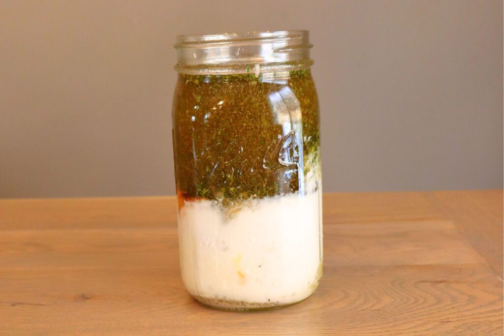 mason jar full of dairy free ranch ingredients