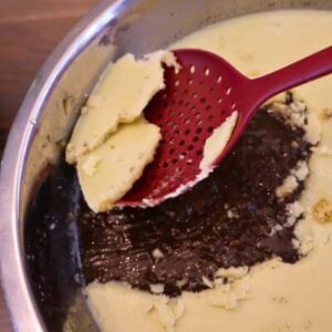 Skimming fat skimming off the fat from cooled homemade beef bone broth