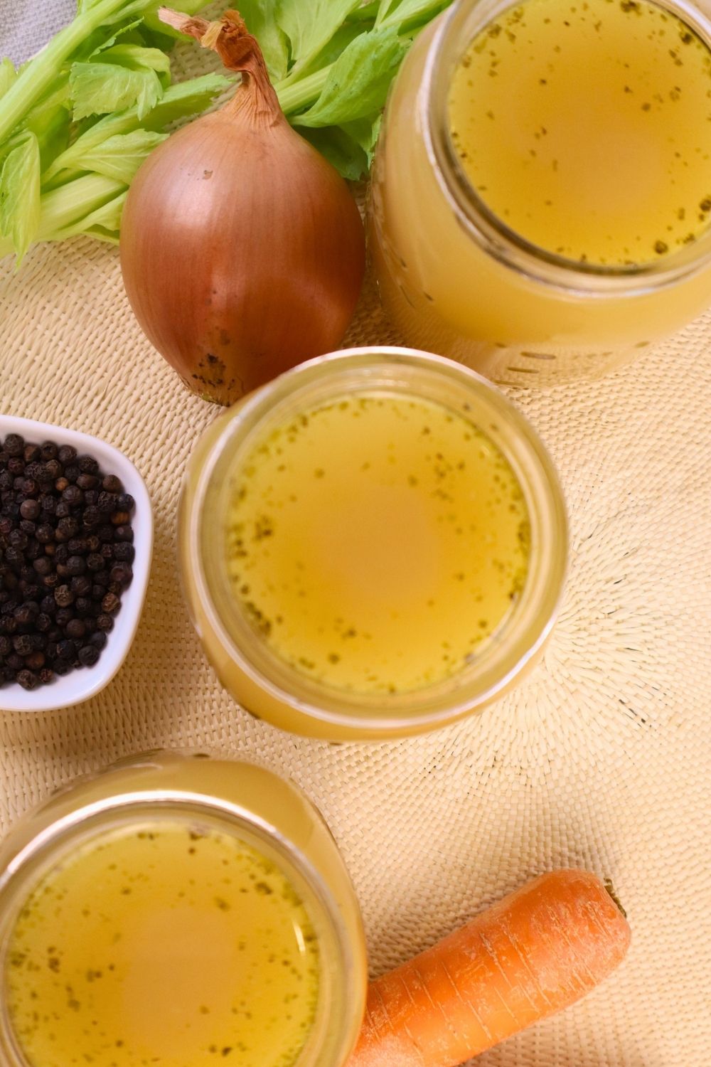 Step-by-step chicken bone broth recipe on the stovetop for a rich, flavorful broth that gels when chilled