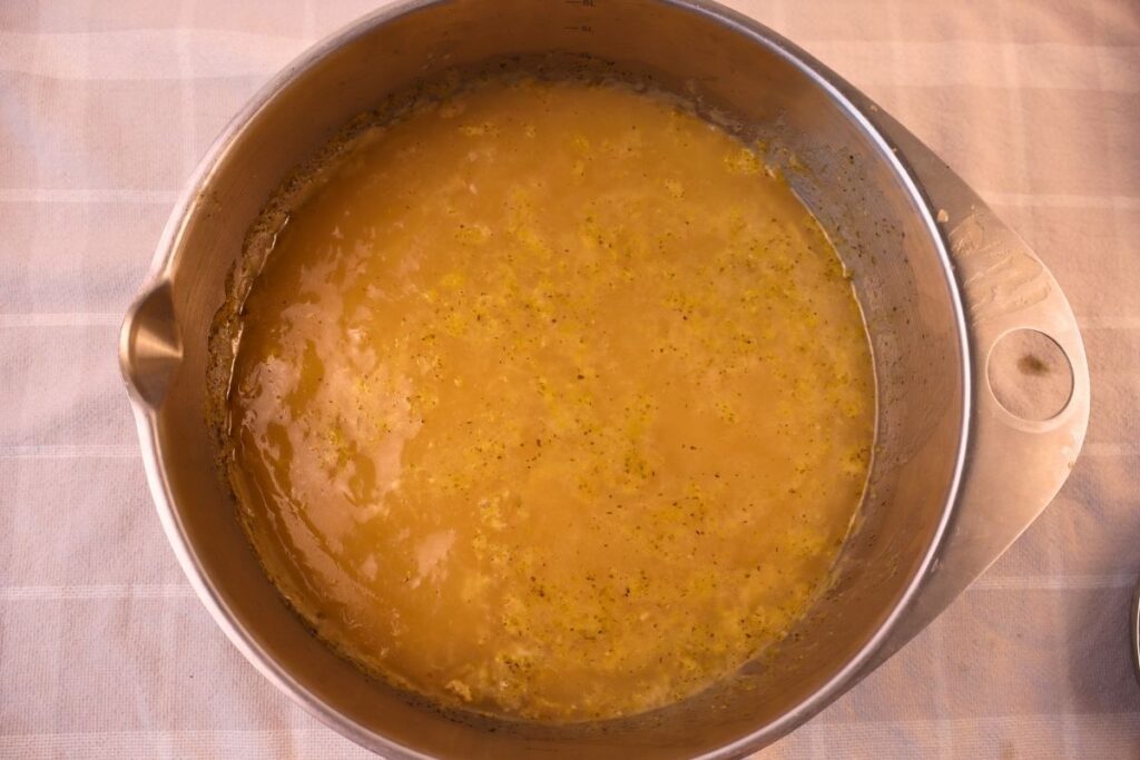 Bowl full of gelatinous chicken bone broth.