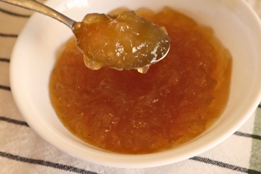 gelled bone broth in a bowl showing thick, jiggly texture after refrigeration 