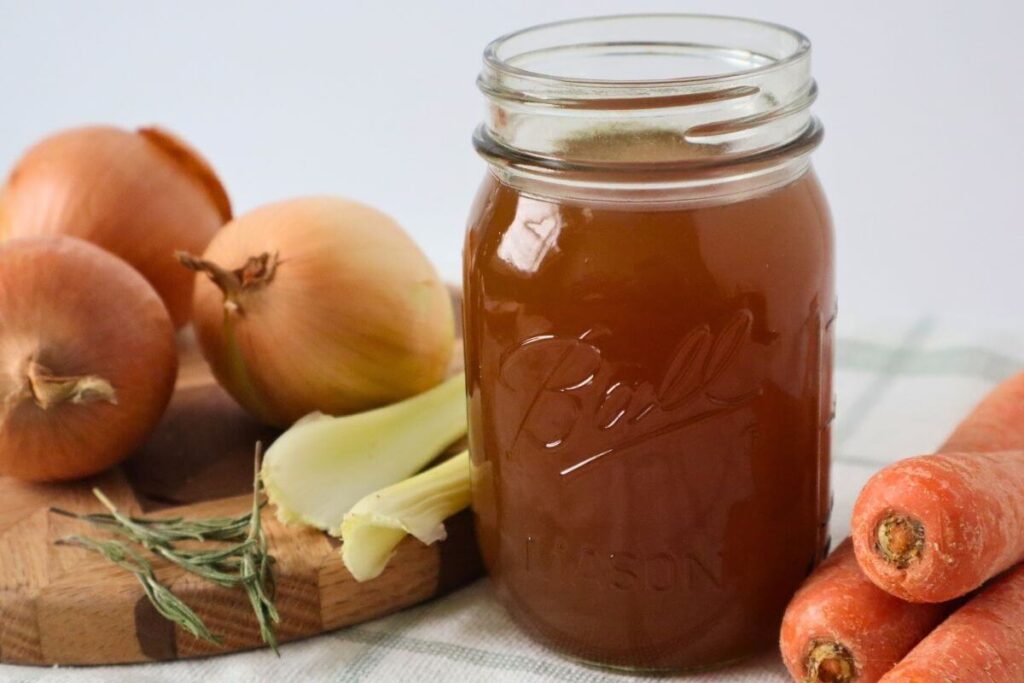 How to Make Beef Bone Broth in an Electric Roaster (Large Batch, From Scratch) 5 beef bone broth and vegetables