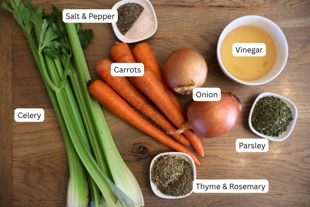 Chicken bone broth ingredients laying on a table.