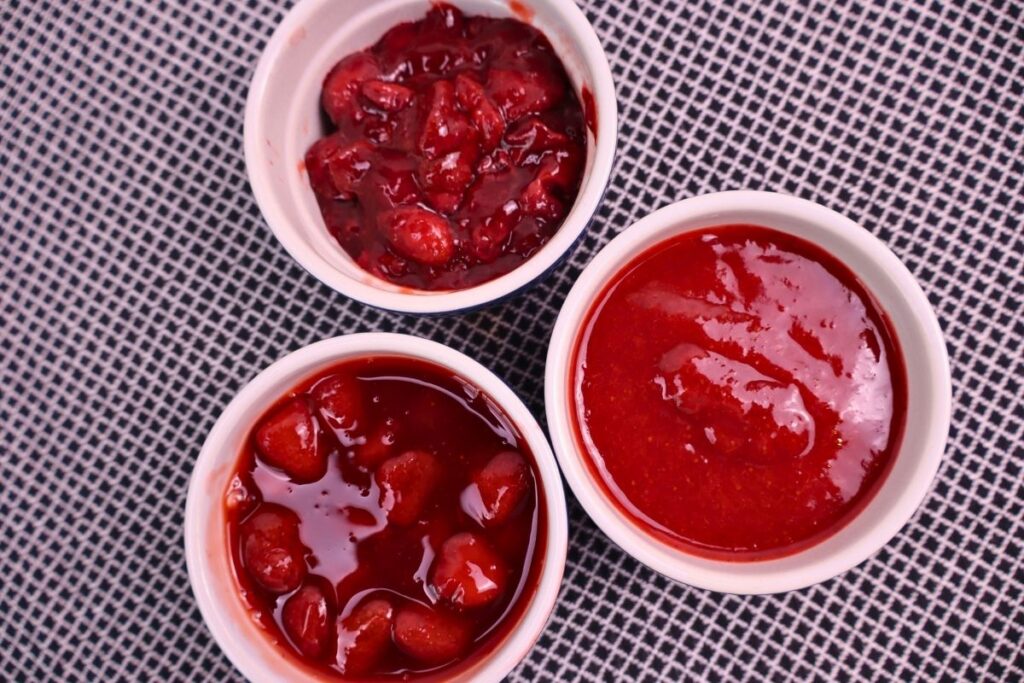 Side-by-side comparison of strawberry sauce in three bowls, each with a different texture.