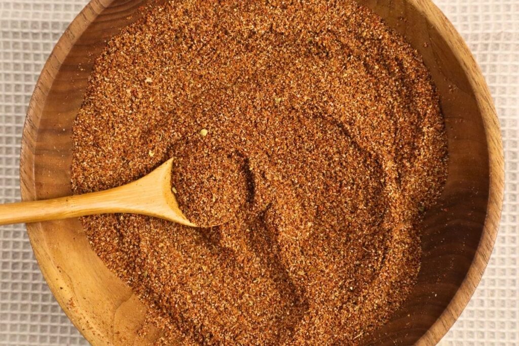 Overhead shot of homemade taco seasoning ingredients after being mixed together in a bowl.